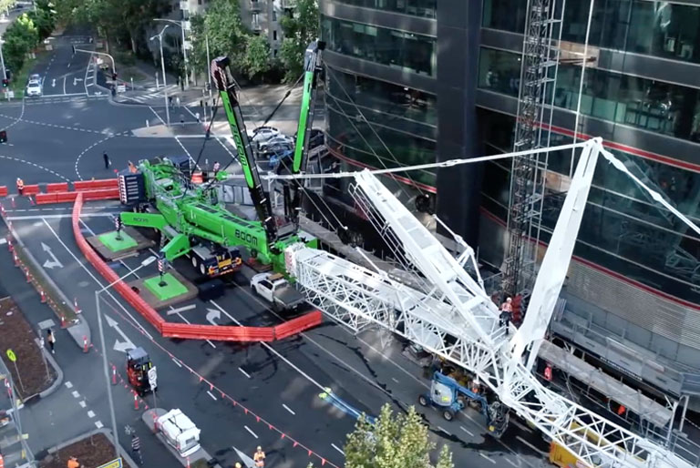 BOOM Logistics crane operating in a city environment